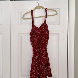 Thin strapped romper with adjustable belt.